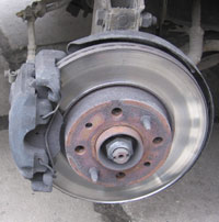 Wheel removed from a car.